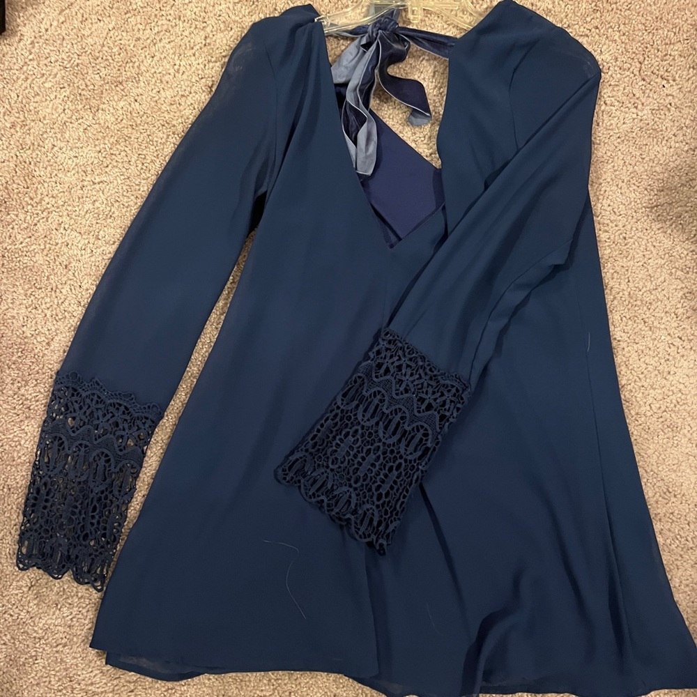 Navy blue shift dress with crocheted sleeves